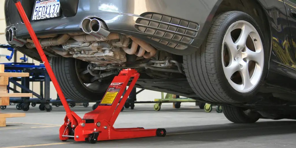 best floor jack for SUV lifting vehicle in garage