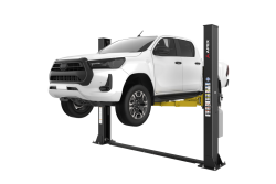 APEX AL9LC two post floorplate car lift designed for low ceiling automotive shops. A compact 9000 lb lift solution available at Wrenchers.com for professional service bays.