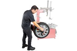APEX AB24M manual wheel balancer with hand-spin operation and digital accuracy