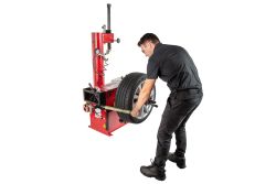 APEX AT26B combo tire changer with mounted manual wheel balancer in compact shop layout