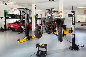 MaxJax portable car lift under car access