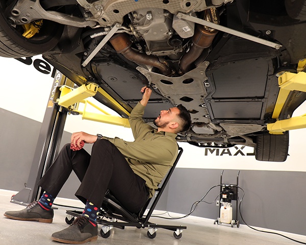 MaxJax portable car lift under car access